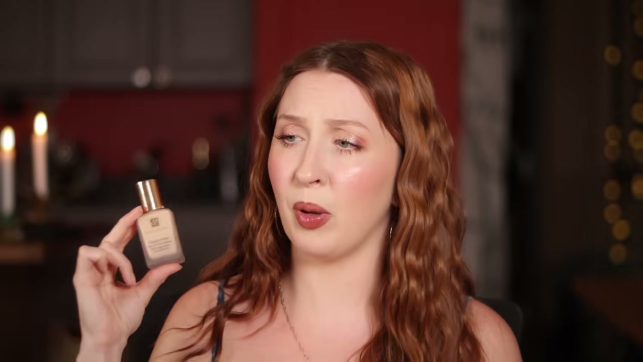 @evangelinemolly reviewing Estée Lauder Double Wear Foundation at 08:47 in a YouTube Shorts video