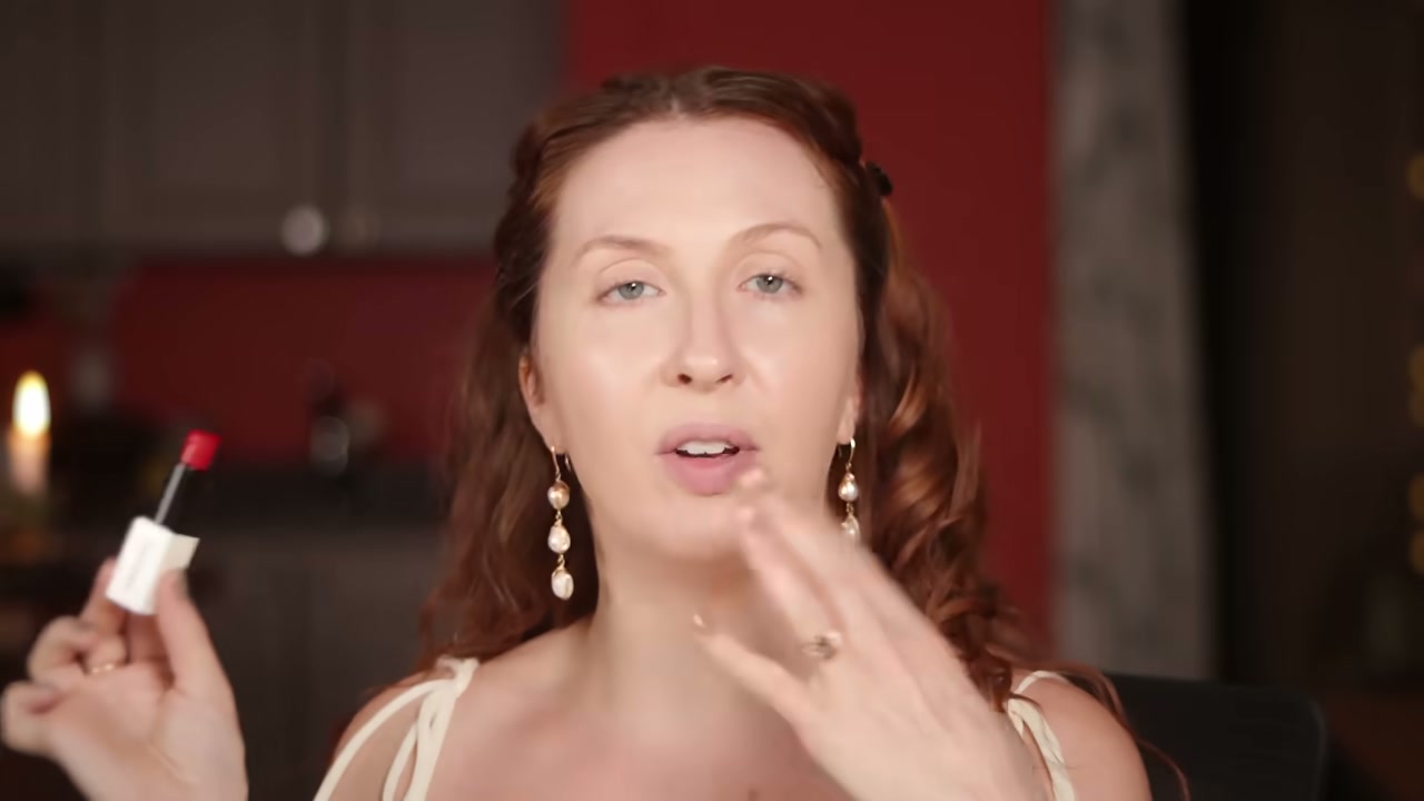 @evangelinemolly reviewing Typology Lip Balm at 04:54 in a YouTube Shorts video