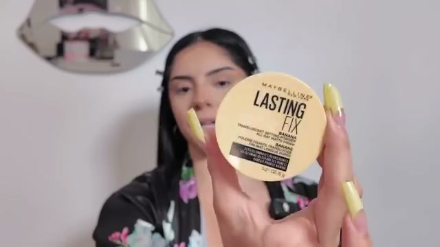 _evess mentioning Maybelline Lasting Fix Loose Powder at 12:40 in their YouTube video