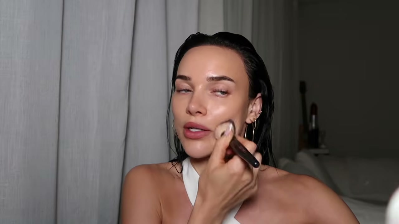 @genelle reviewing Armani Beauty Luminous Silk Foundation at 03:05 in a YouTube Shorts video