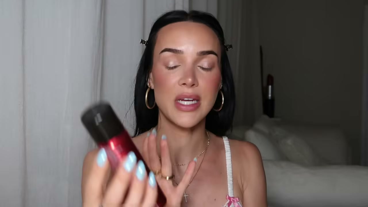 @genelle reviewing L'Oreal Paris Infallible 3 Second Setting Mist at 14:42 in a YouTube Shorts video