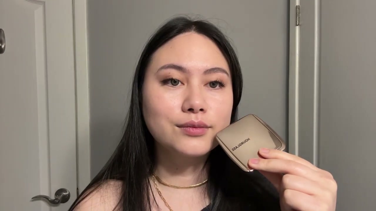 @girlythelazy reviewing Hourglass Ambient Powder Bronzer at 04:05 in a YouTube Shorts video