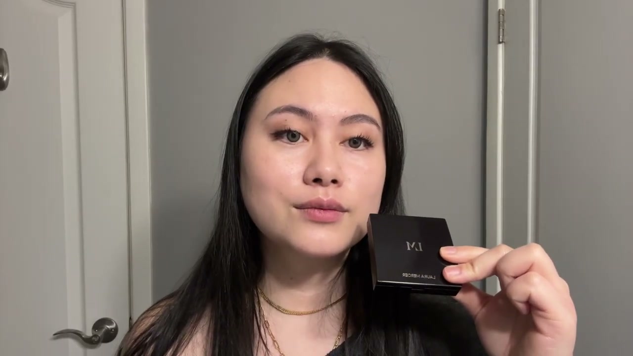 @girlythelazy reviewing Laura Mercier Bronze Color Infusion Powder Bronzer Duo at 04:23 in a YouTube Shorts video