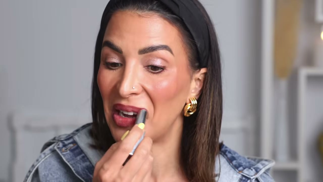 @glamgirlgabi reviewing e.l.f. Cosmetics Glow Reviver Lipstick at 25:19 in a YouTube Shorts video