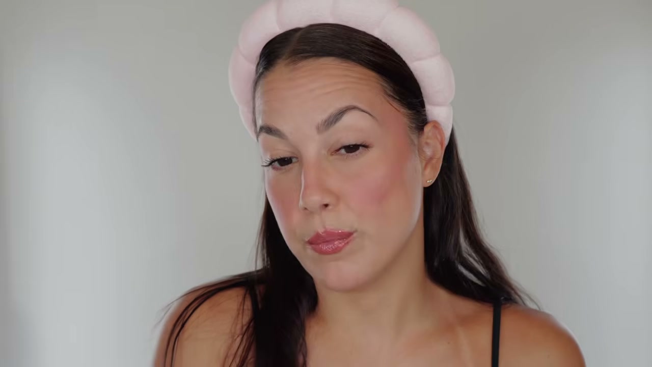@glamourbylexi reviewing Danessa Myricks Beauty Blurring Setting Spray at 22:04 in a YouTube Shorts video