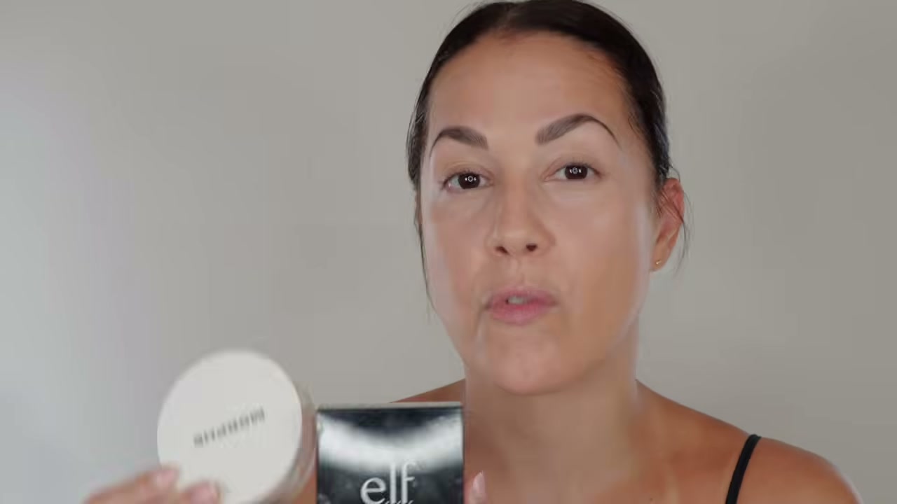 @glamourbylexi reviewing Morphe Loose Powder at 11:37 in a YouTube Shorts video