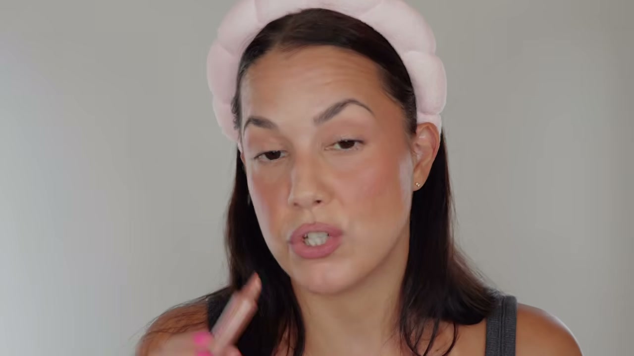 @glamourbylexi reviewing Rhode Peptide Lip Treatment at 15:10 in a YouTube Shorts video
