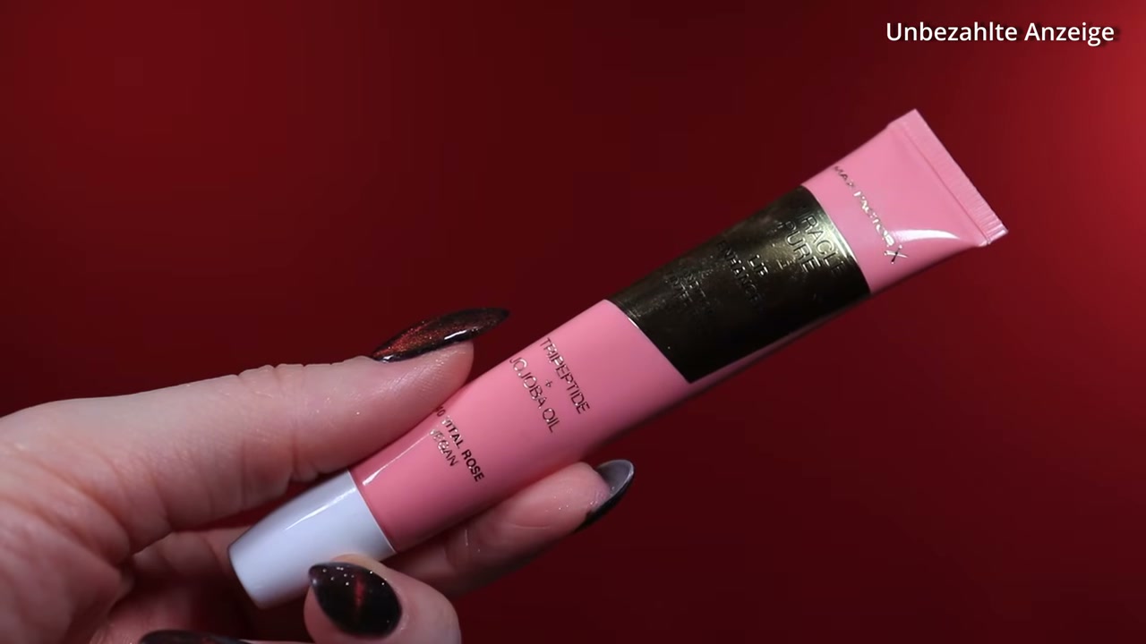 @helgamua reviewing Max Factor Miracle Pure Lip Enhancer at 46:11 in a YouTube Shorts video