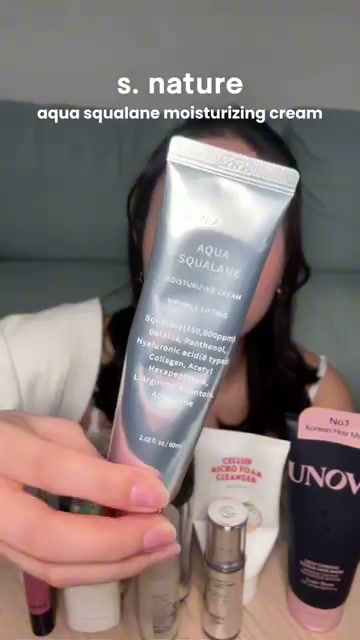 @imjennymoon reviewing S.NATURE Aqua Squalane Moisturizing Cream at 00:29 in a YouTube Shorts video