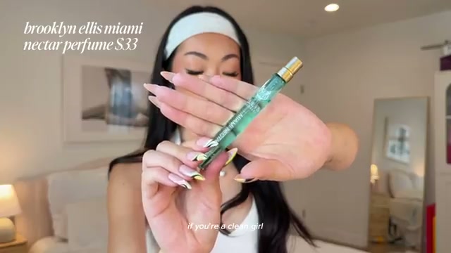@itsbabykelz reviewing Brooklyn Ellis Miami Nectar Perfume at 15:18 in a YouTube Shorts video