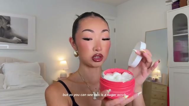 @itsbabykelz reviewing Bush Bomb Ingrown Hair Exfoliating Scrub at 03:47 in a YouTube Shorts video
