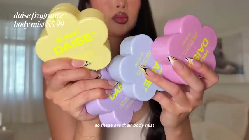 @itsbabykelz reviewing Days Body Mist at 14:14 in a YouTube Shorts video