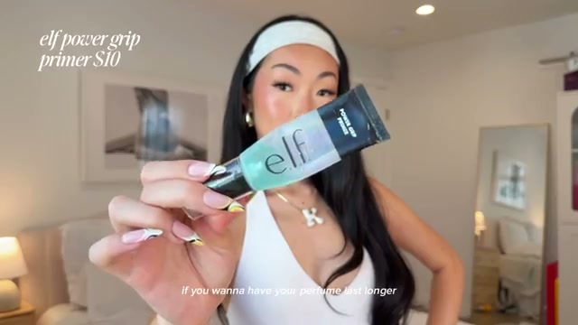 @itsbabykelz reviewing e.l.f. Cosmetics Sticky Primer at 14:59 in a YouTube Shorts video