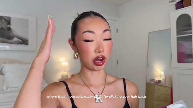 @itsbabykelz reviewing Not Your Mother's Hair Care Styling Cream and Mousse at 08:08 in a YouTube Shorts video