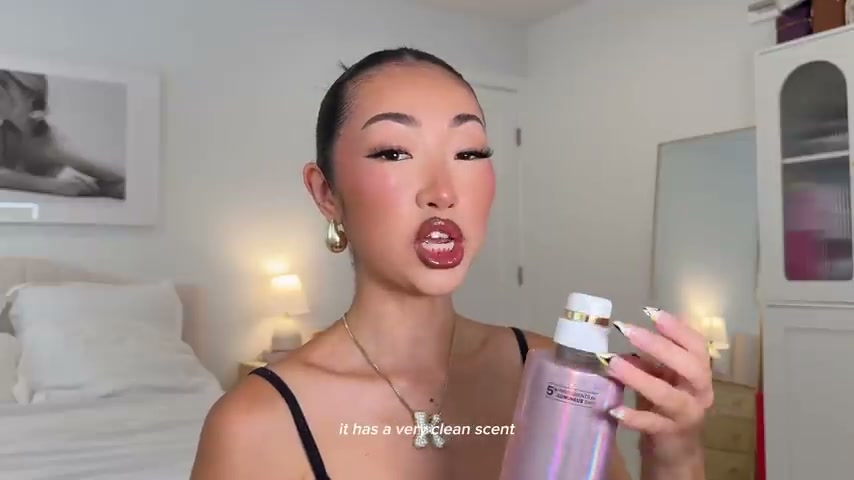 @itsbabykelz reviewing Olay Super Serum Body Wash at 01:28 in a YouTube Shorts video
