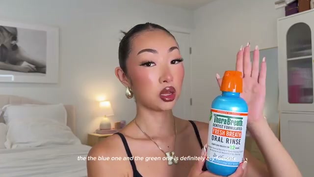 @itsbabykelz reviewing TheraBreath Mouthwash at 10:38 in a YouTube Shorts video
