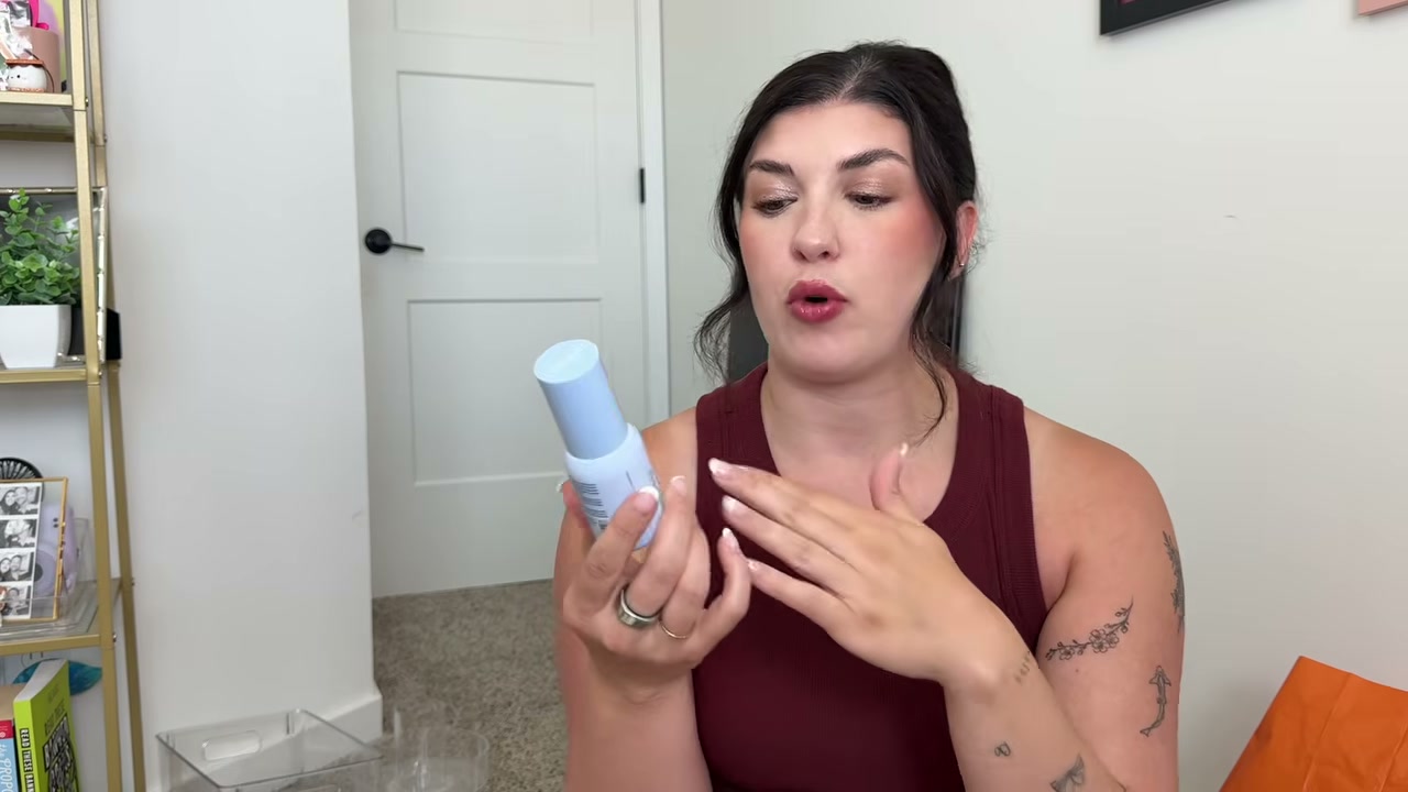 @itsjensworld14 reviewing Priori Universal Skin Solution Dermal Spray for Face and Body at 02:21 in a YouTube Shorts video