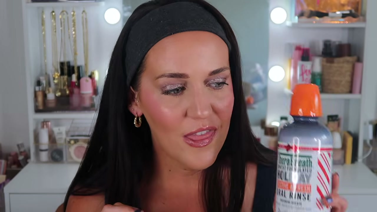 @itsjuststephslife reviewing Therabreath Mouthwash at 18:50 in a YouTube Shorts video