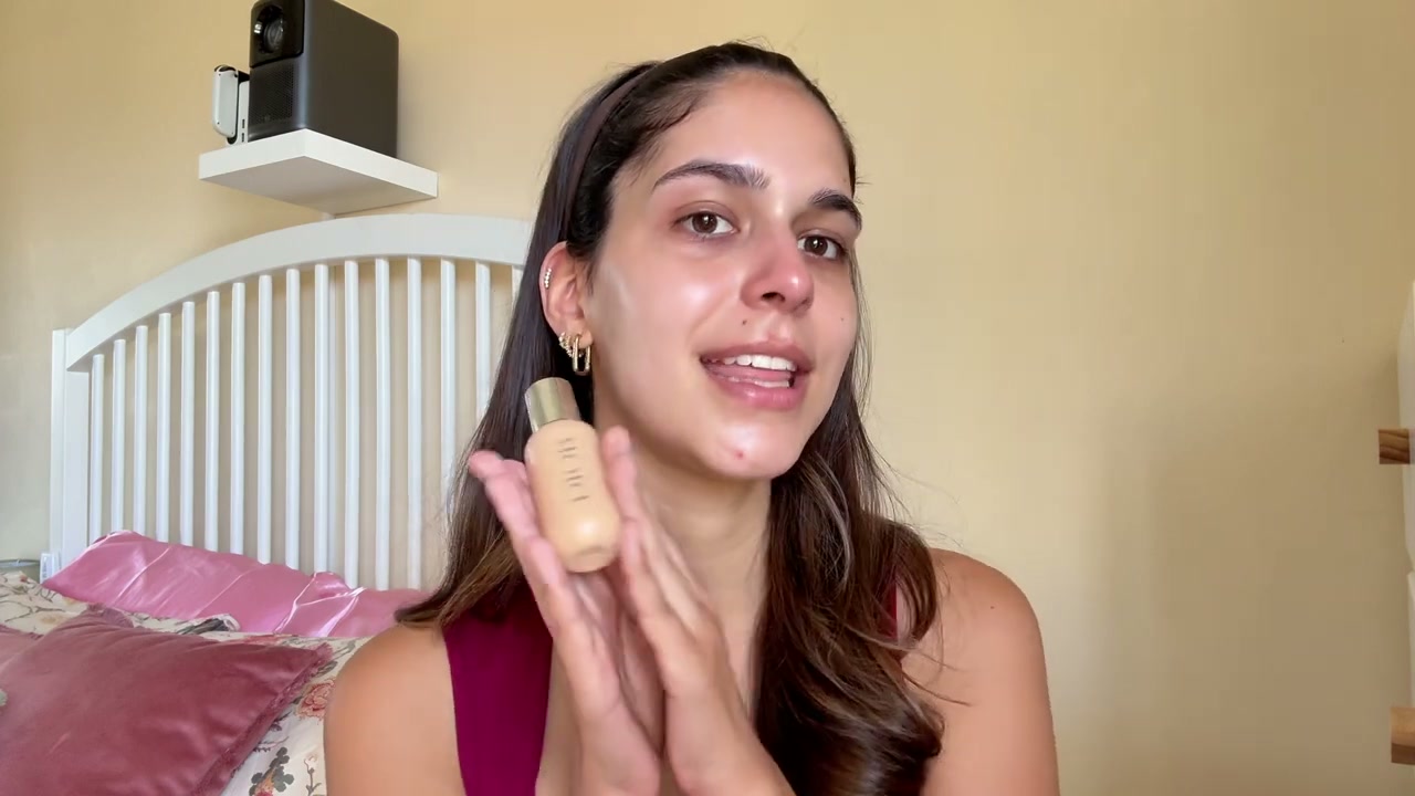 @itslifebycat reviewing Dior Face and Body Foundation at 01:38 in a YouTube Shorts video
