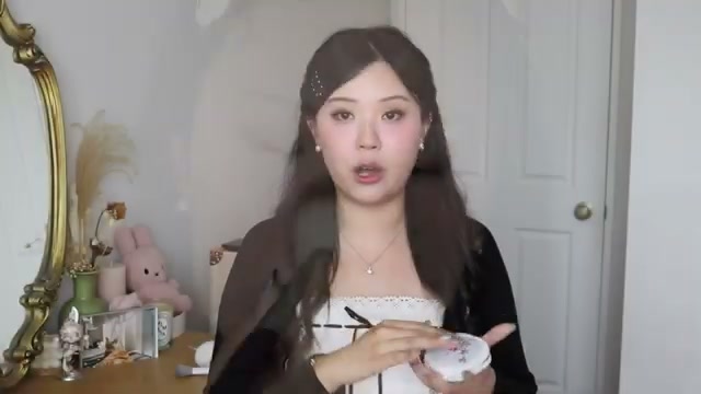 j.uuuuudy mentioning Florasis Tinted Pressed Powder at 18:47 in their YouTube video