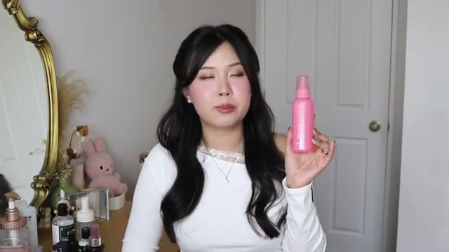 j.uuuuudy mentioning Orus Essence in Hair Milk at 25:58 in their YouTube video