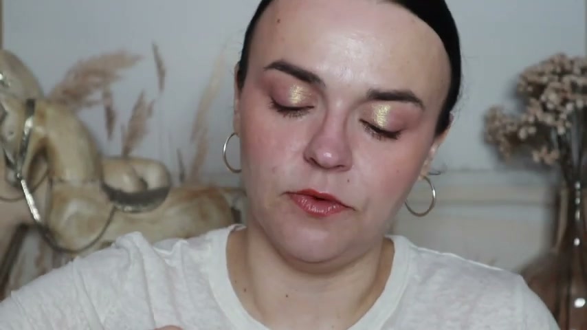 @jessicadeerly reviewing ColourPop Fresh Kiss Glossy Lip Balm at 22:32 in a YouTube Shorts video