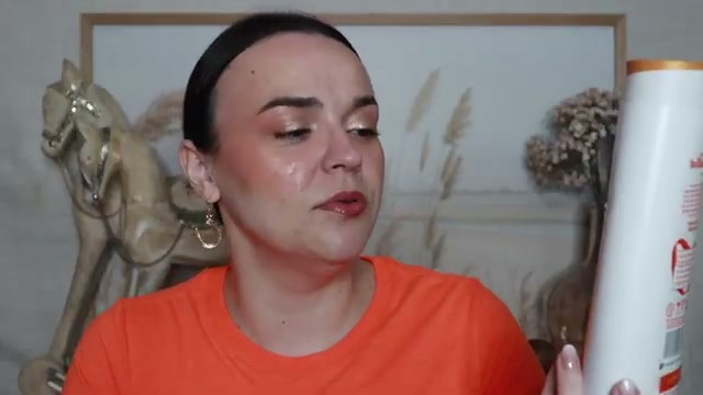 @jessicadeerly reviewing Dove Nourishing Body Wash at 12:54 in a YouTube Shorts video