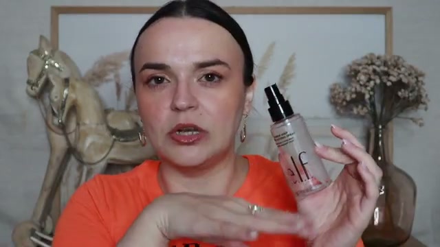 @jessicadeerly reviewing e.l.f. Cosmetics Power Grip Dewy Setting Spray at 27:53 in a YouTube Shorts video