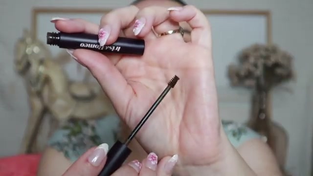 @jessicadeerly reviewing Iris & Romeo Brow Up Thickening Brow Balm at 17:33 in a YouTube Shorts video