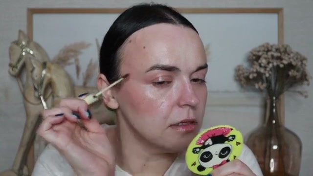 @jessicadeerly reviewing Versed Easy Brow Tinted Gel at 14:17 in a YouTube Shorts video
