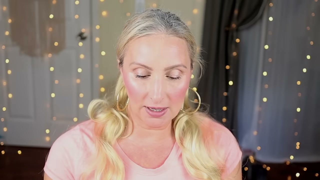 @jessicathedollardiva reviewing Be Pure Shimmer Liquid Shadow at 09:43 in a YouTube Shorts video
