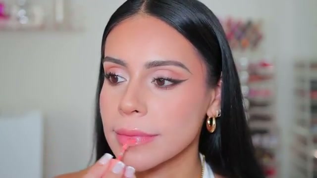 @juicyjas reviewing Bubble X E.L.F. Glow Talk Lip Serum at 17:10 in a YouTube Shorts video