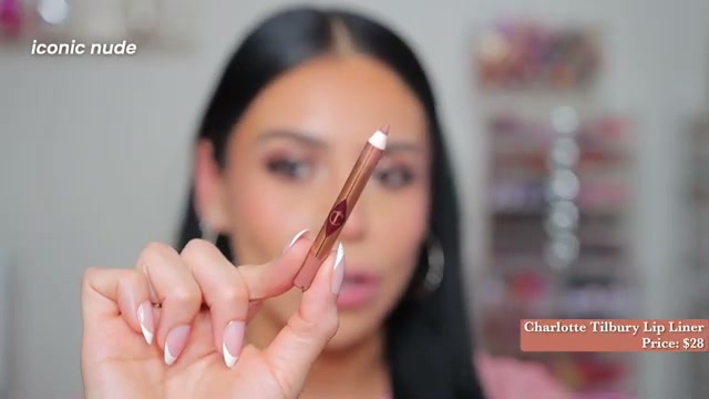 @juicyjas reviewing Charlotte Tilbury Lip Cheat Lip Liner at 03:30 in a YouTube Shorts video