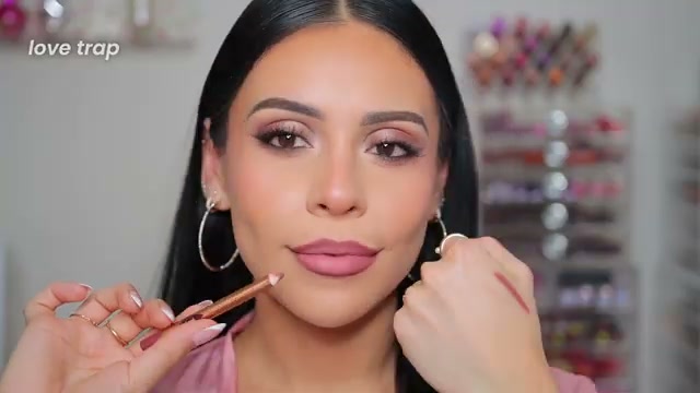 @juicyjas reviewing Charlotte Tilbury Lip Cheat Lip Liner at 05:25 in a YouTube Shorts video
