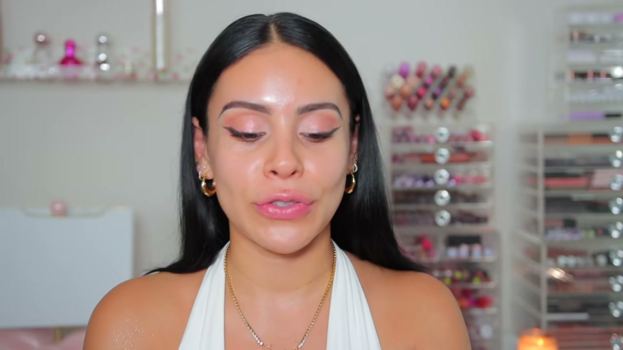 @juicyjas reviewing CoverGirl Yummy Big Oil Stick at 01:34 in a YouTube Shorts video