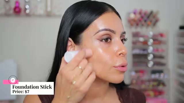 @juicyjas reviewing Essence Foundation Stick at 05:47 in a YouTube Shorts video