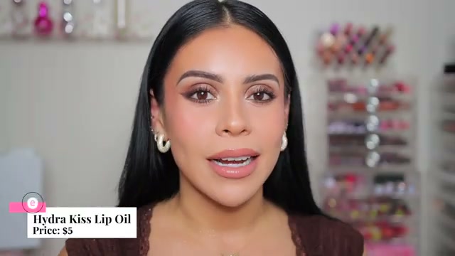 @juicyjas reviewing Essence Hydra Kiss Lip Oil at 13:30 in a YouTube Shorts video