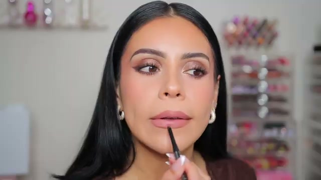 @juicyjas reviewing Essence Slim Stick Lipstick at 13:17 in a YouTube Shorts video