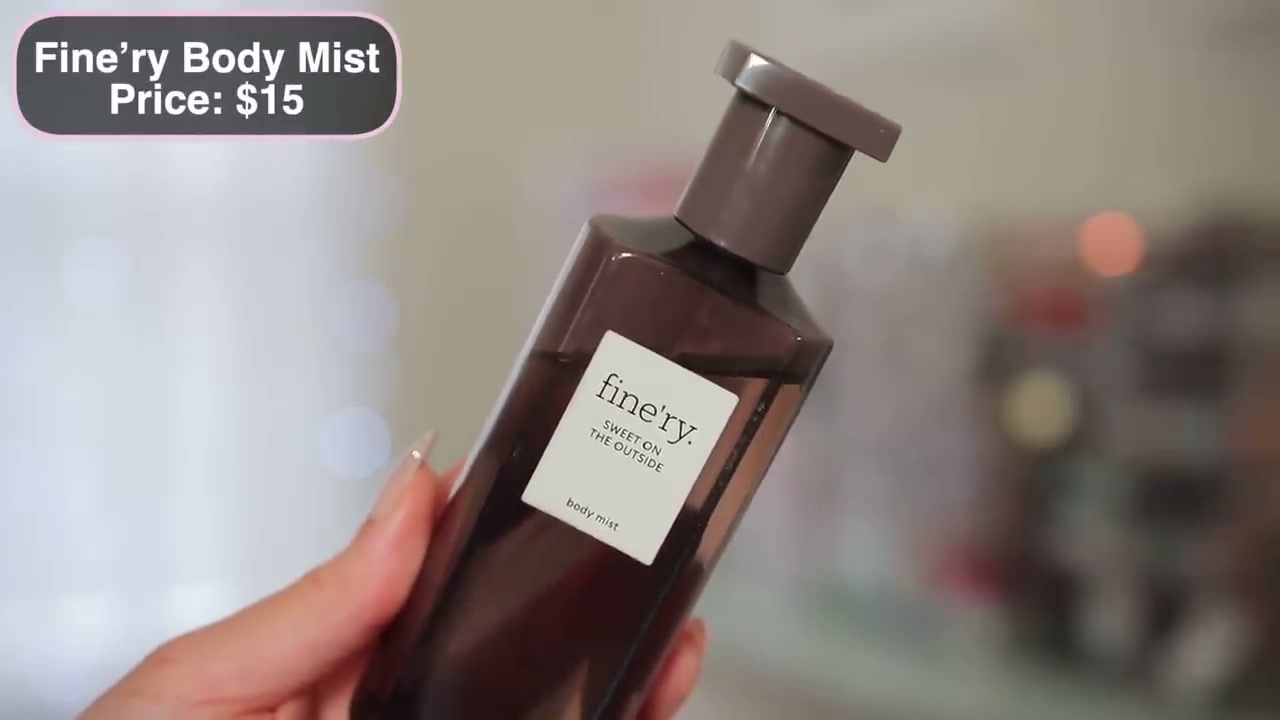 @juicyjas reviewing Fine'ry Sweet on the Outside Body Mist at 09:04 in a YouTube Shorts video