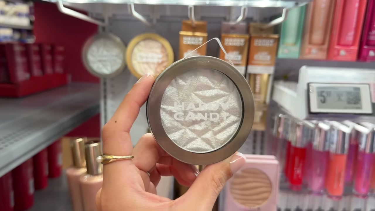 @juicyjas reviewing Hard Candy Just Glow Luminizer at 15:13 in a YouTube Shorts video