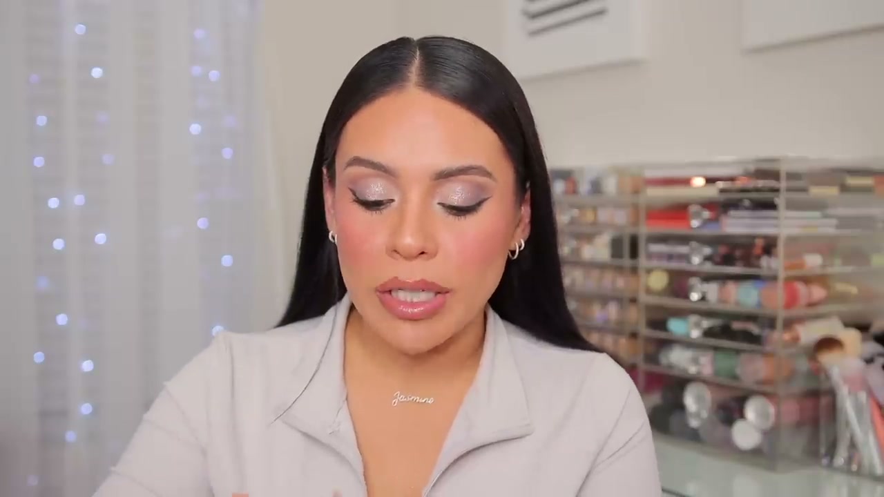@juicyjas reviewing Josie Maran Argan Oil Body Butter at 05:41 in a YouTube Shorts video