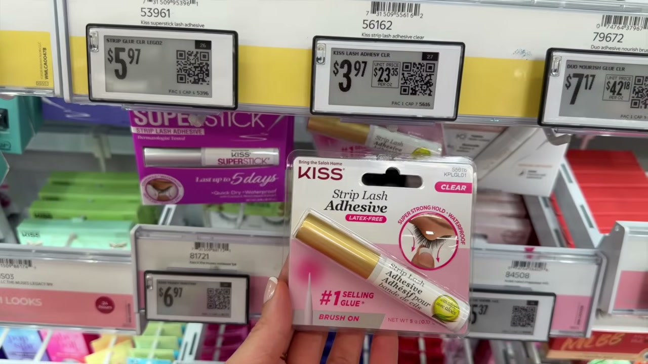 @juicyjas reviewing KISS SuperStick Strip Lash Adhesive at 06:07 in a YouTube Shorts video