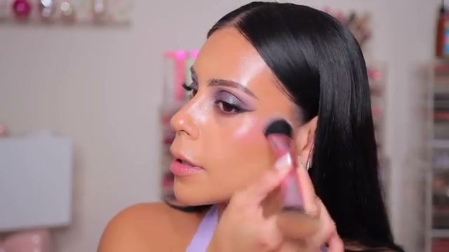 @juicyjas reviewing Kylie Cosmetics Glow Lip and Cheek Balm at 07:46 in a YouTube Shorts video