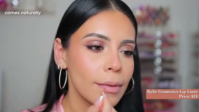 @juicyjas reviewing Kylie Cosmetics Precision Pout Lip Liner at 02:52 in a YouTube Shorts video