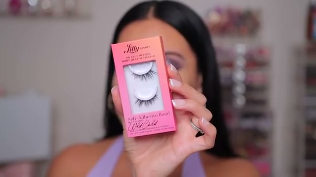 @juicyjas reviewing Lilly Lashes Self Adhesive Lashes at 05:12 in a YouTube Shorts video