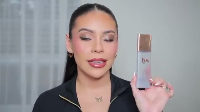 @juicyjas reviewing LYS Beauty Setting Spray at 27:27 in a YouTube Shorts video