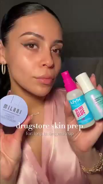 @juicyjas reviewing NYX Face Glue Setting Spray at 00:01 in a YouTube Shorts video