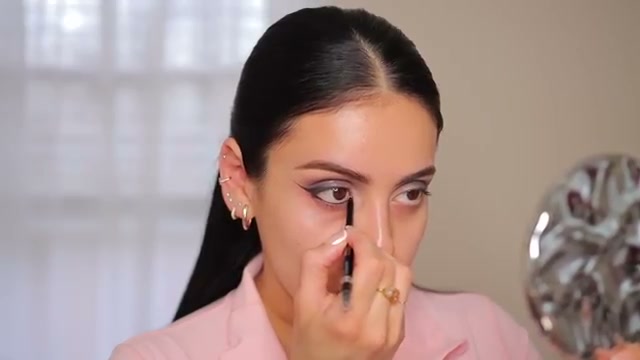 @juicyjas reviewing Persona Cosmetics 24 Hour Waterproof Eyeliner at 10:11 in a YouTube Shorts video