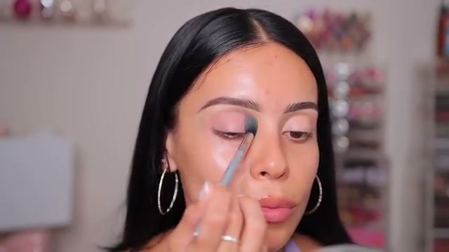 @juicyjas reviewing Profusion Midnight 35 Shade Palette at 02:17 in a YouTube Shorts video