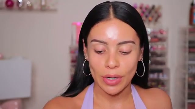 @juicyjas reviewing Rare Beauty Eyeshadow Primer at 01:40 in a YouTube Shorts video